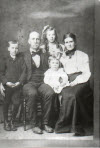 Photograph of William Hank Jewel and Cora Winstone Jewel and family.