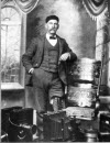 Photograph of William Hank Jewel with his camera.
