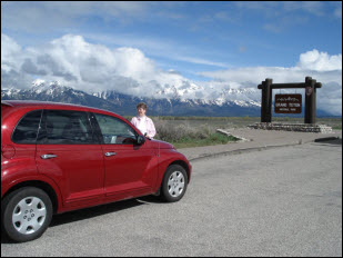 Picture of Pat and our rental car.