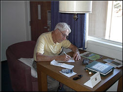 Jim Geary at work on our travel journal.