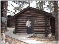 Photograph of Jim in front of our cabin at North Rim.